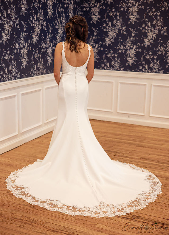 A Formalities bride in her wedding gown