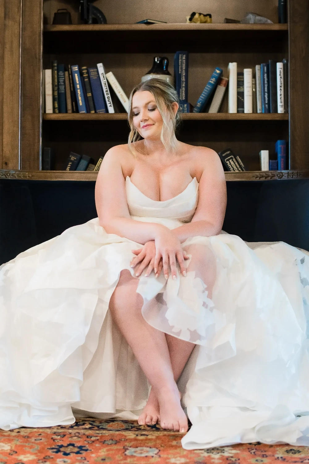 A curvy bride in her wedding gown at Formalities