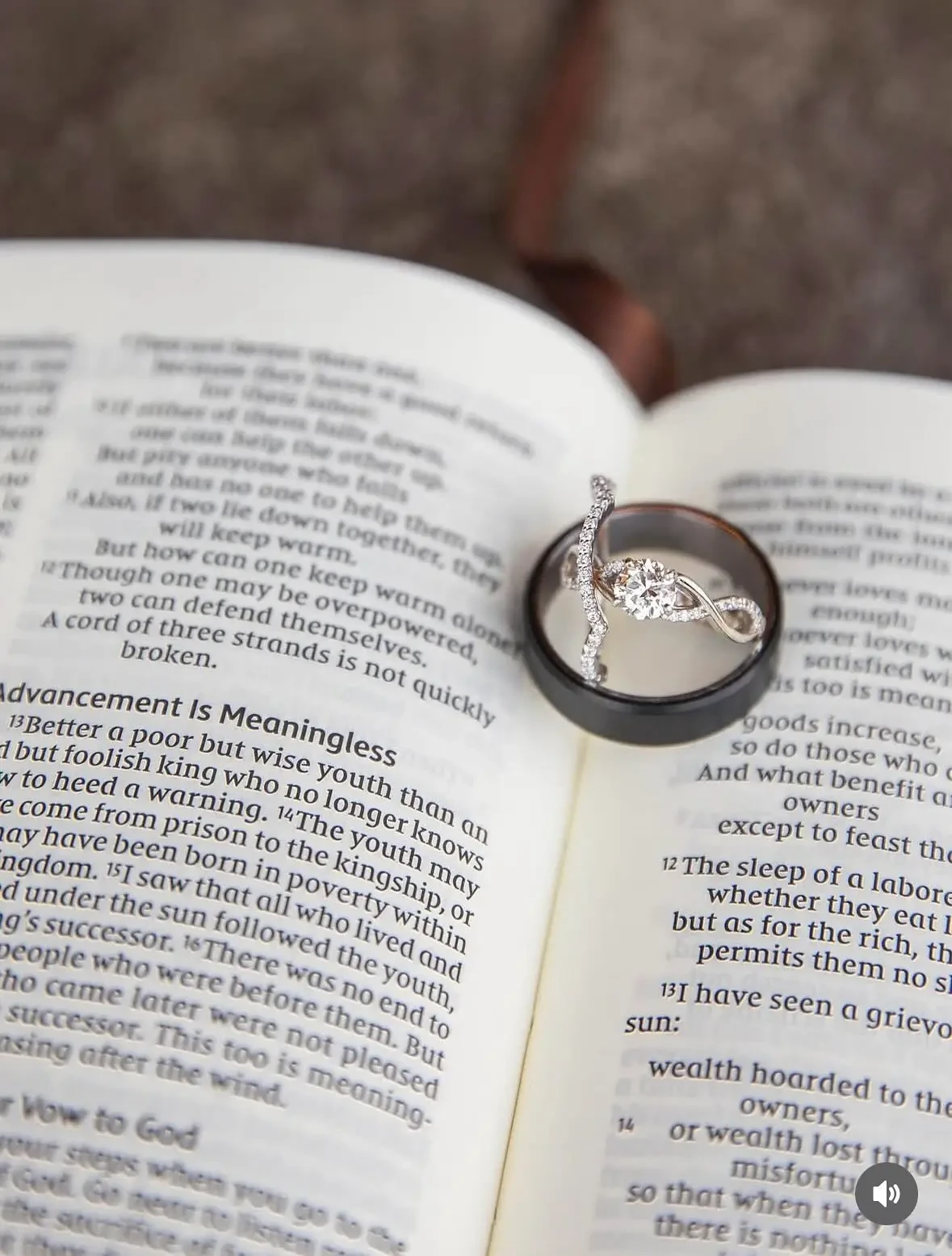 wedding ring between book pages