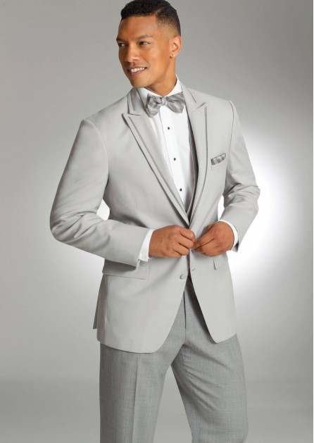 Model wearing a white suit