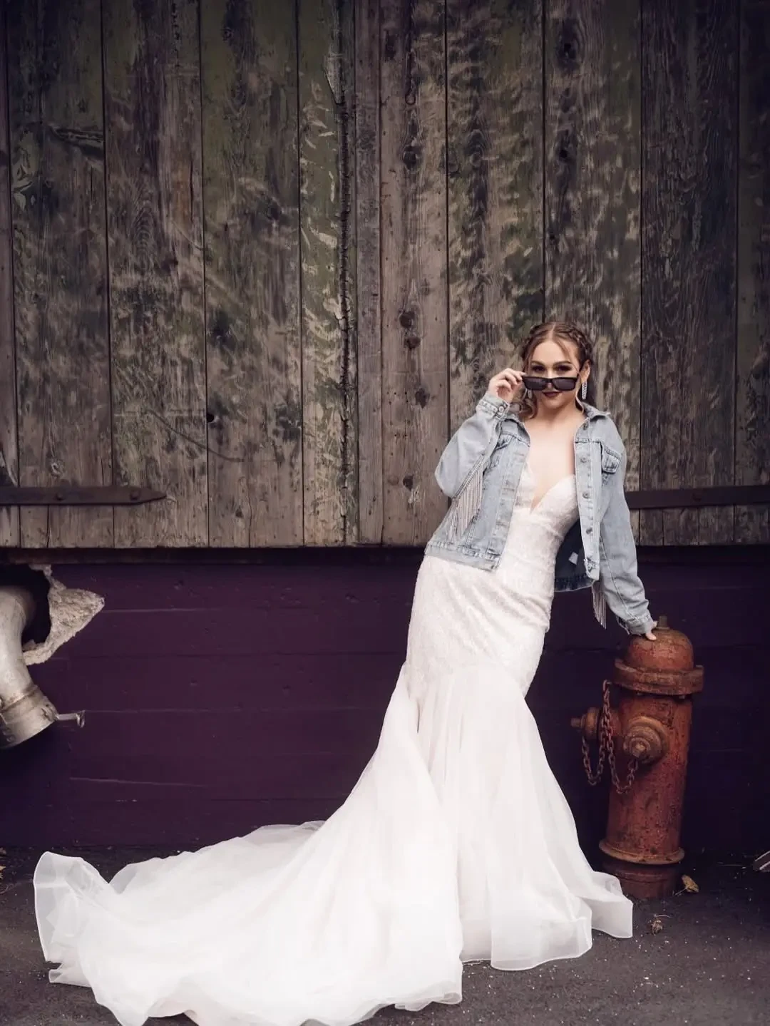Model Wearing a Wedding Dress and a Jean Jacket